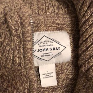 Men’s brown zippered turtle neck cotton sweater with long sleeves.